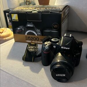 Nikon D5200 DSLR Camera with 18-55mm lens with Strap and case